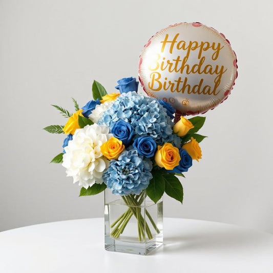 Birthday Wishes Bouquet with white blue hydrangeas dark blue and yellow roses and birthday balloon.