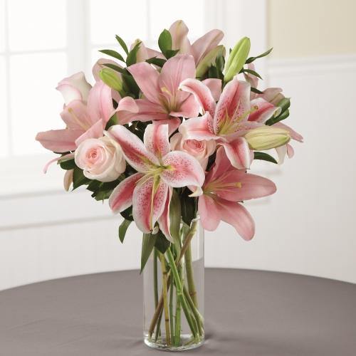 Always and Forever Sympathy Bouquet with pink roses and pink Asiatic lilies in clear glass vase.