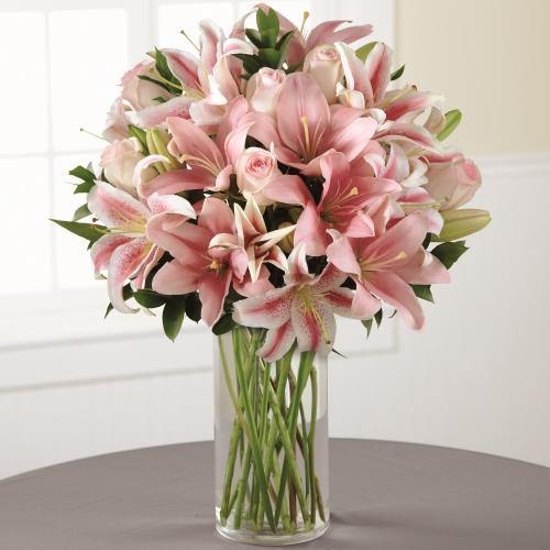 Always and Forever Sympathy Bouquet with pink roses and pink Asiatic lilies in clear glass vase.