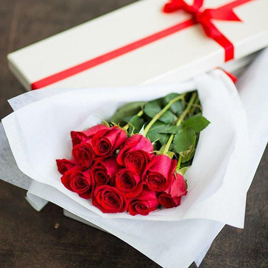 Dozen Boxed Premium Roses – 12 red long-stemmed roses in elegant rose box.