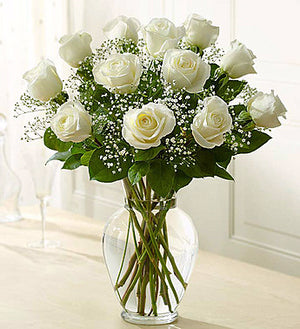 One Dozen Roses In Vase With Baby's Breath (Variety of colors available)